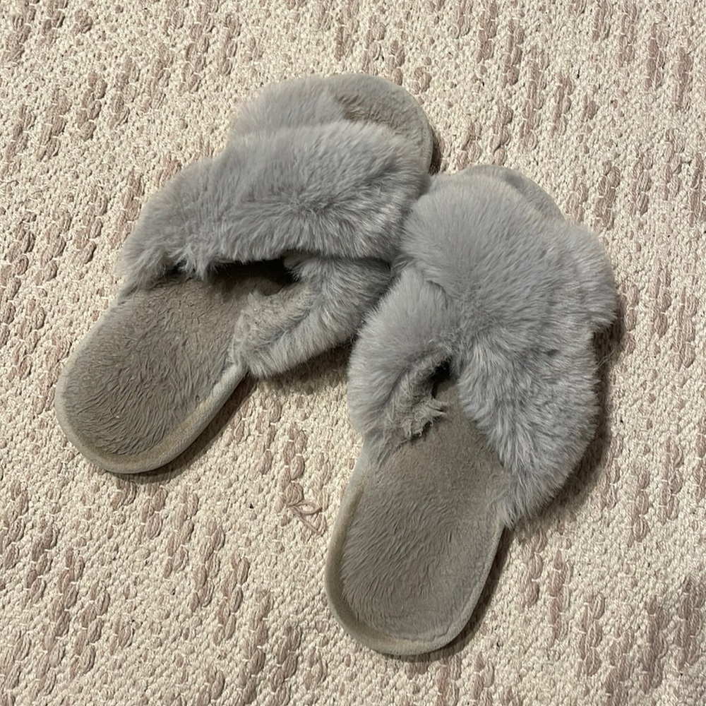 Grey womens slippers. Well worn and well used.
